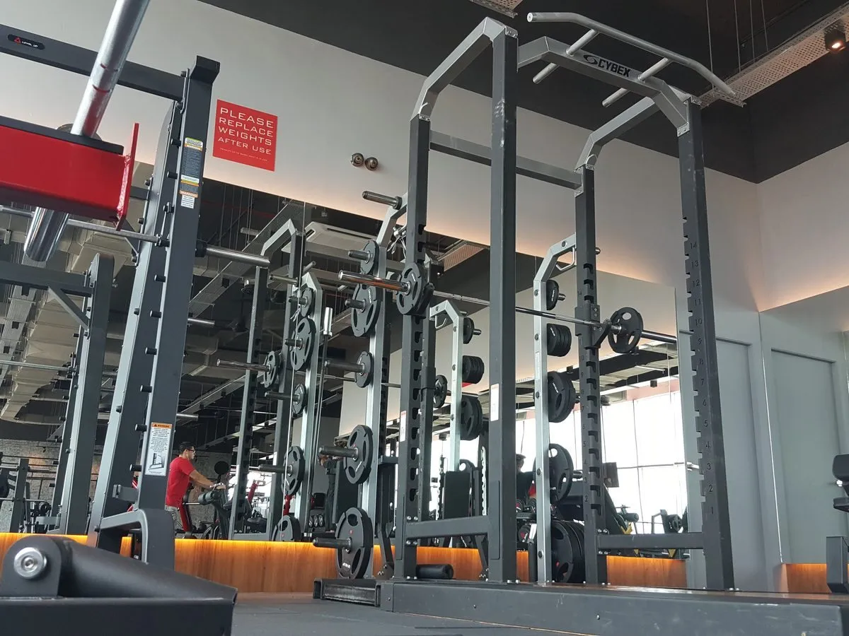 Racks and barbells at Level Up Fitness AEON Mall
