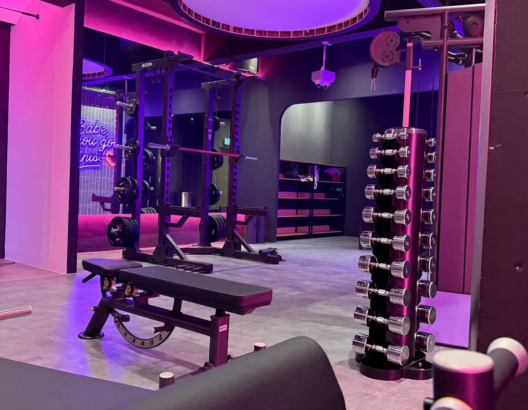 Free weights area with racks and dumbbells at Level Up Fitness Xpress Westfield Points, Kuching